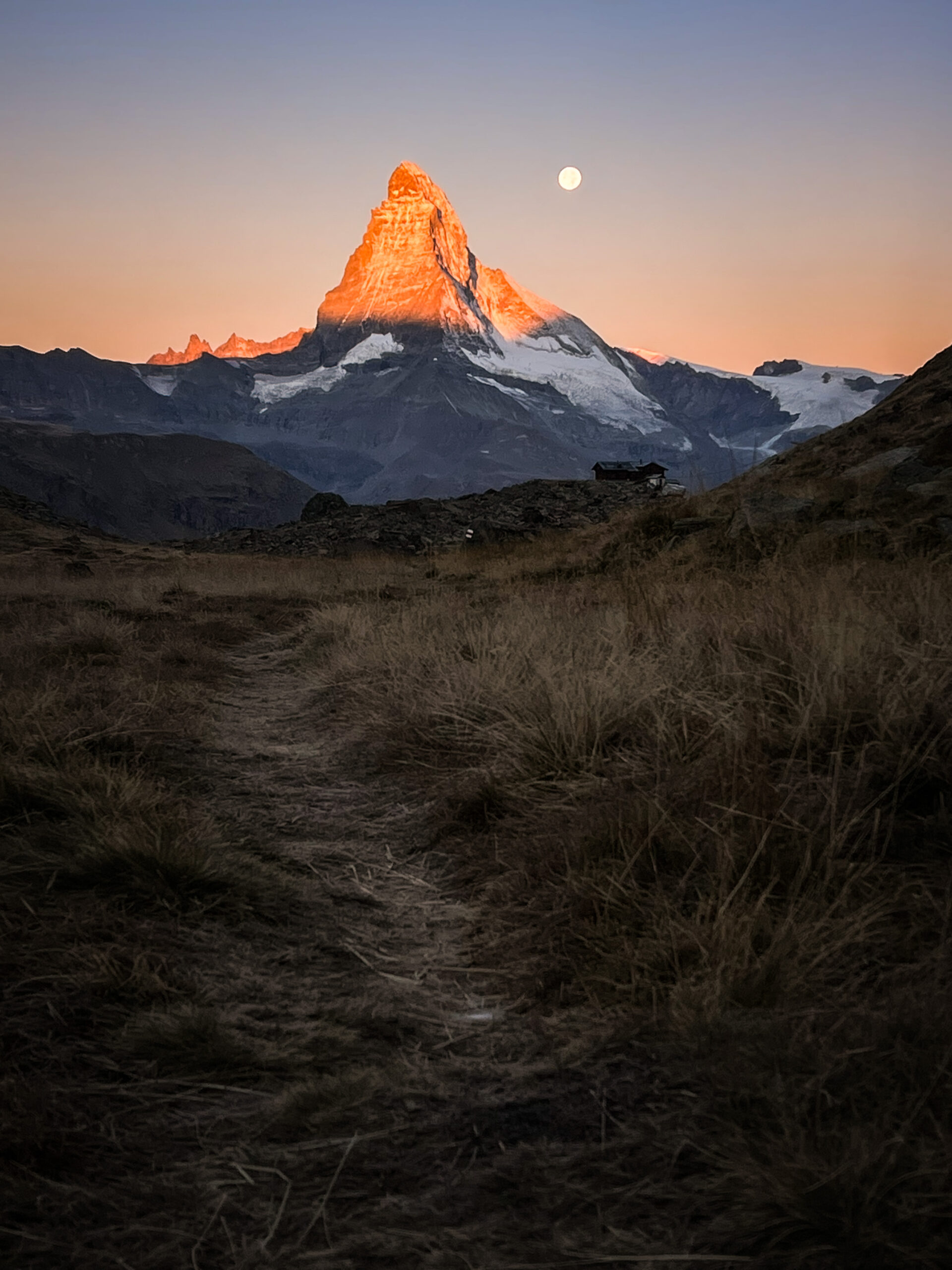 Alpine photographer in the Swiss Alps