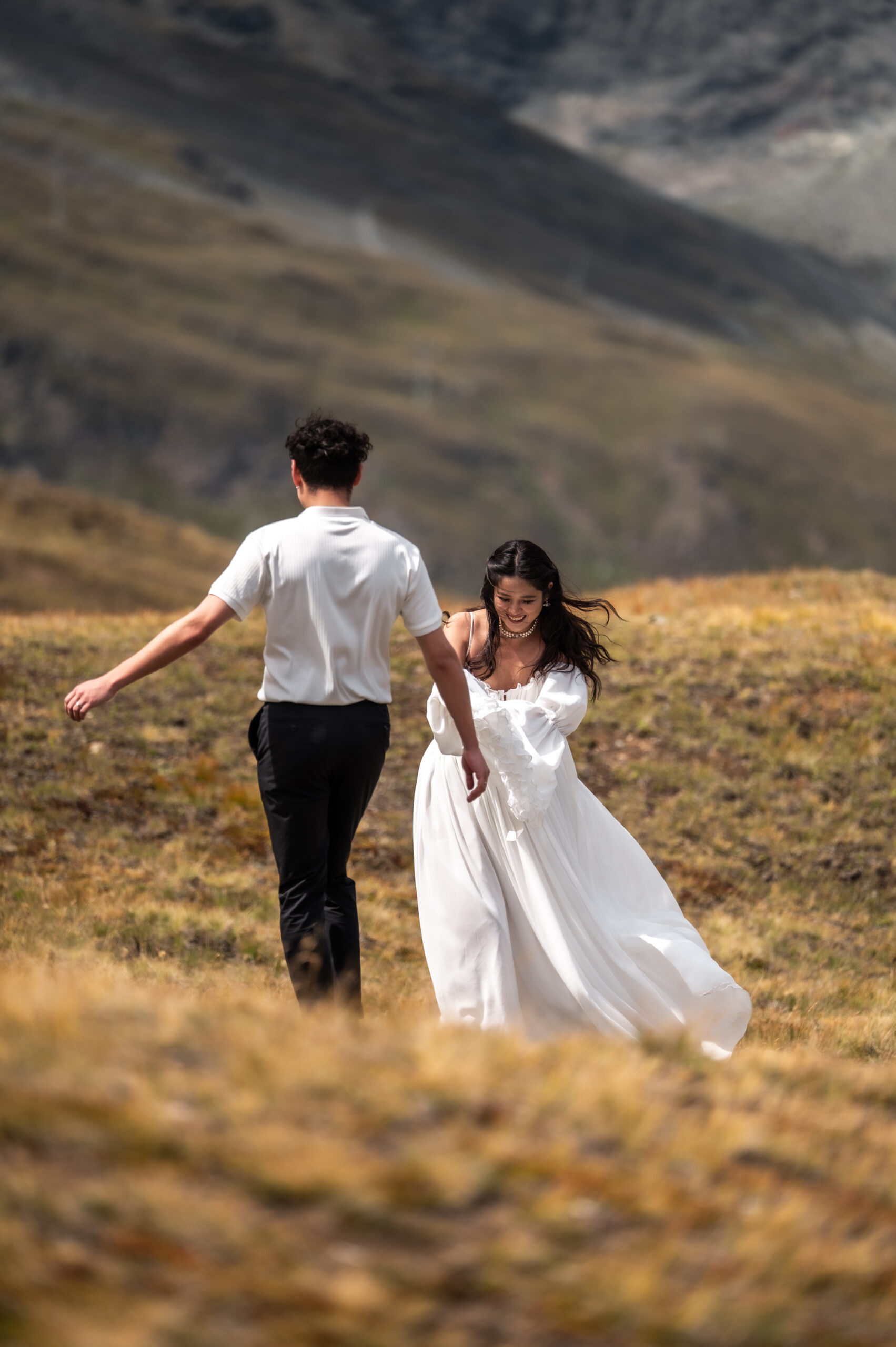Wedding couple walking Zermatt mountains