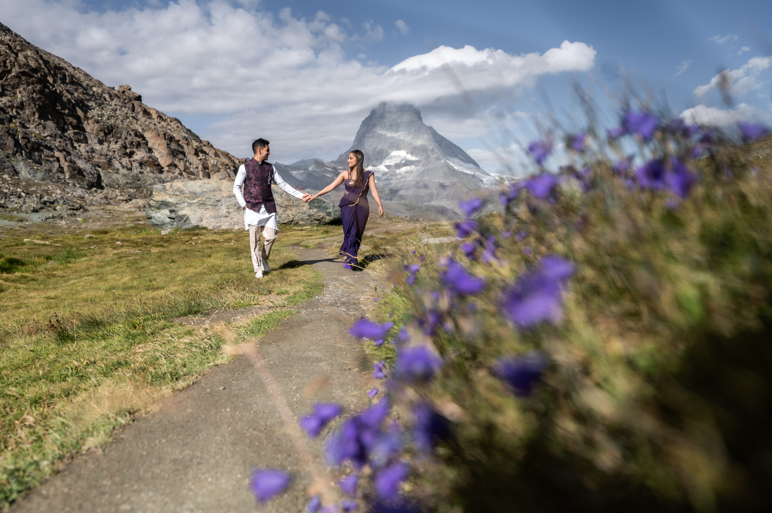 Pre-wedding couple walking flowers Matterhorn